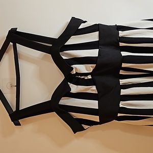 designed by Dressfo, a stylish black and white striped piece dress.